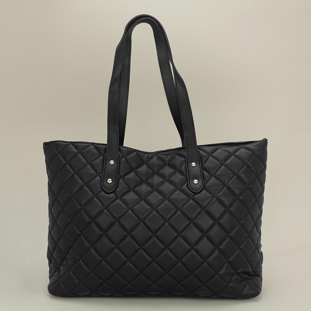 Black diamond-quilted tote bag angled view showing structured silhouette and 9.5 inch shoulder handles