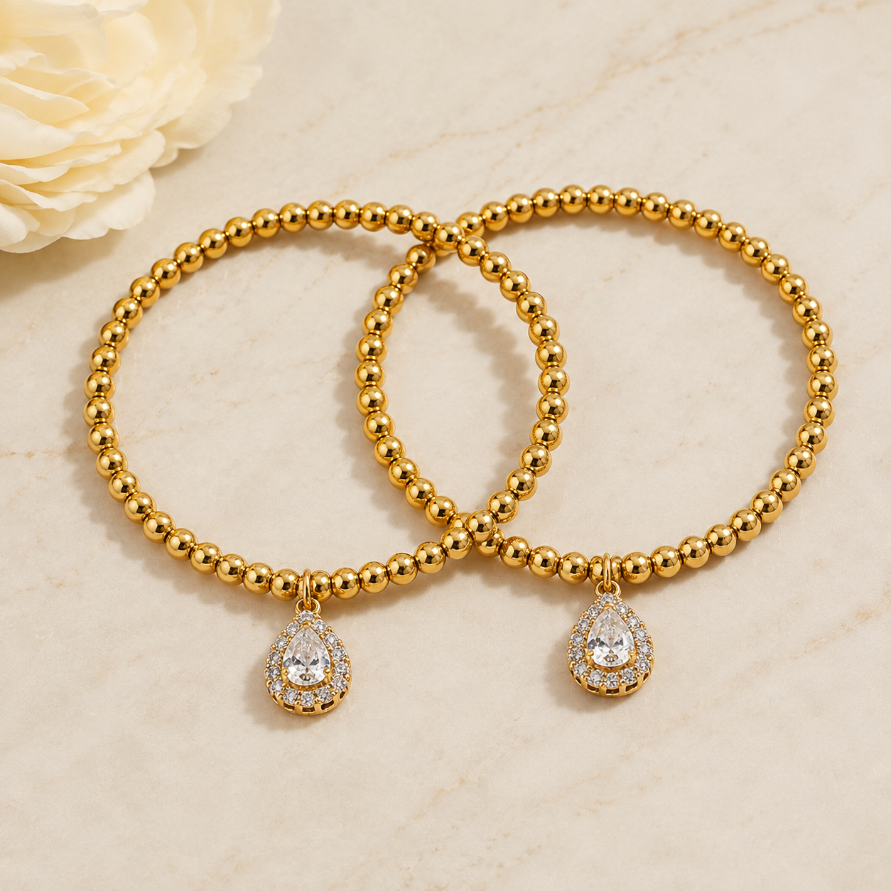 Gold Beaded Stretch Bracelet with CZ Teardrop Charm
