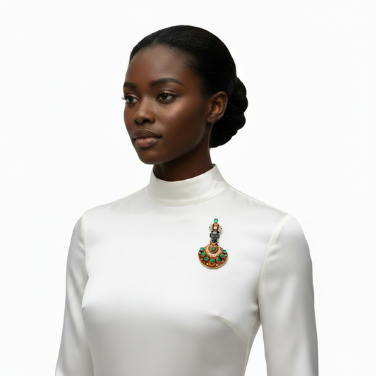 African Brooch on Dress Fabric
