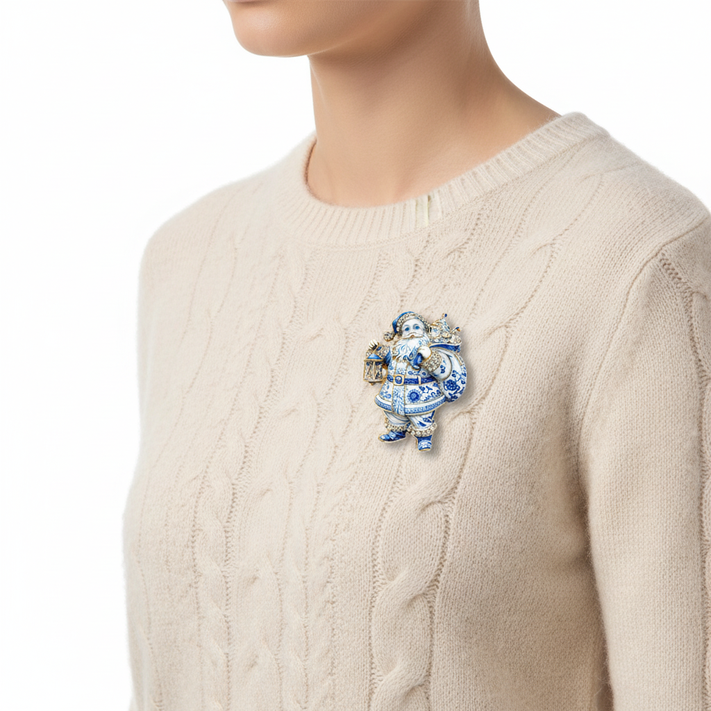 Blue porcelain Santa brooch on cream sweater — side view