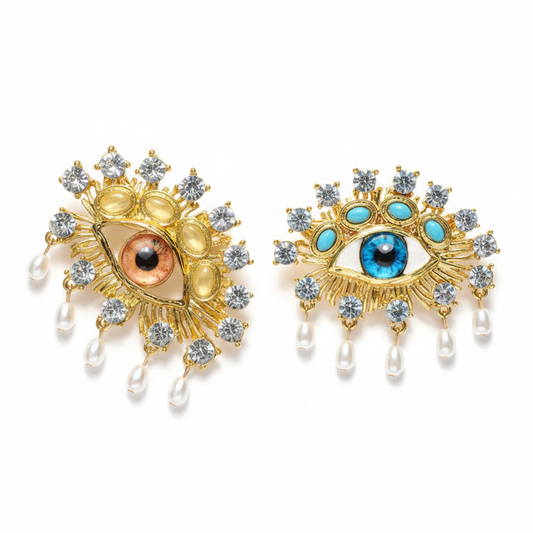 Both evil eye brooches product shot