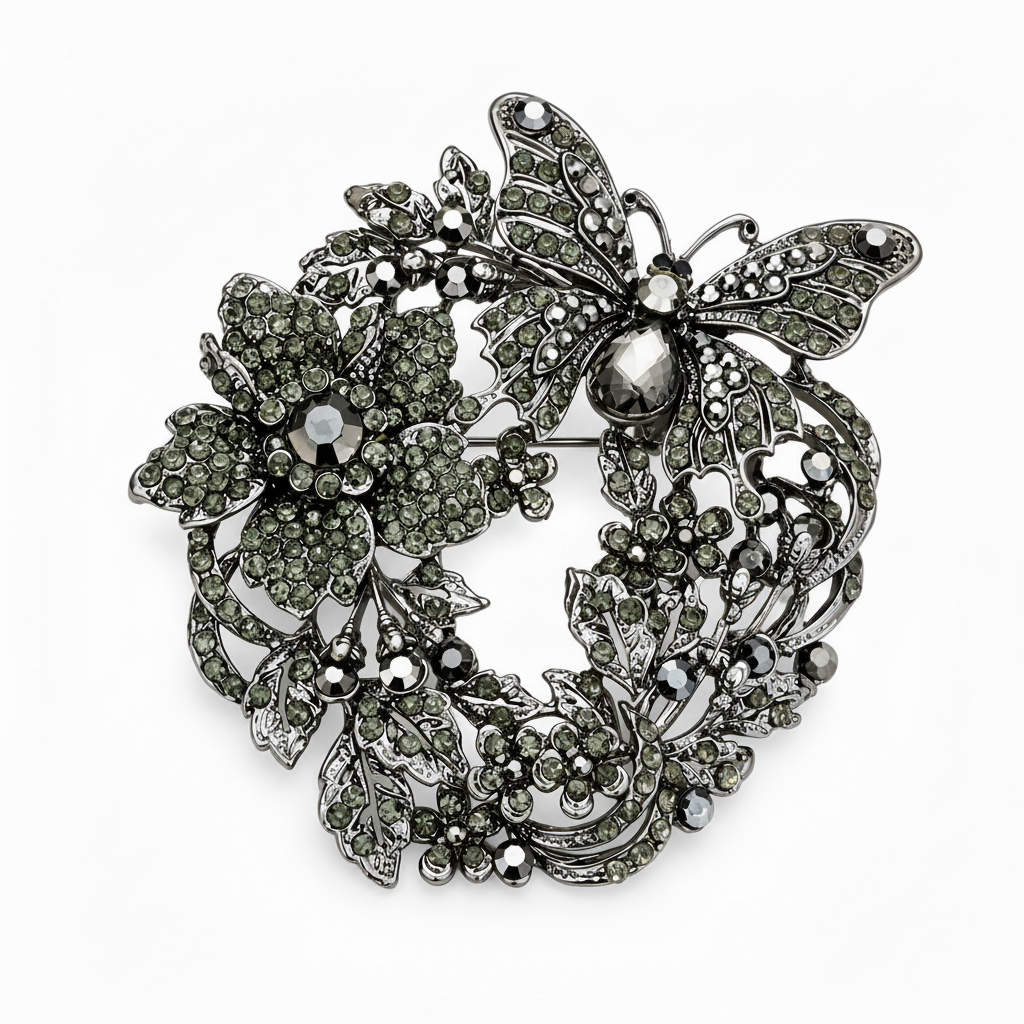Front of dark silver-tone butterfly floral rhinestone brooch pendant with smoky green and gray stones