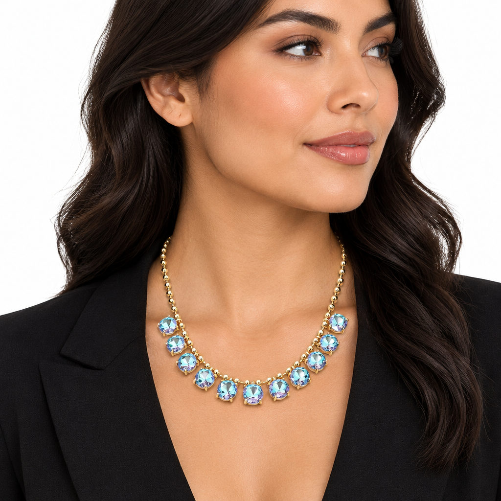 Woman wearing iridescent Aurora Borealis crystal gold-tone collar necklace, three-quarter side view