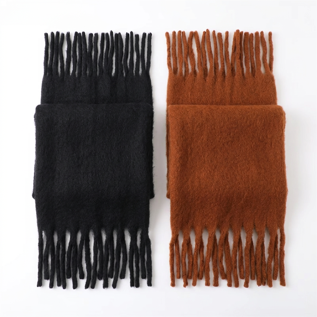 Product-only black and burnt orange scarf set on a white background