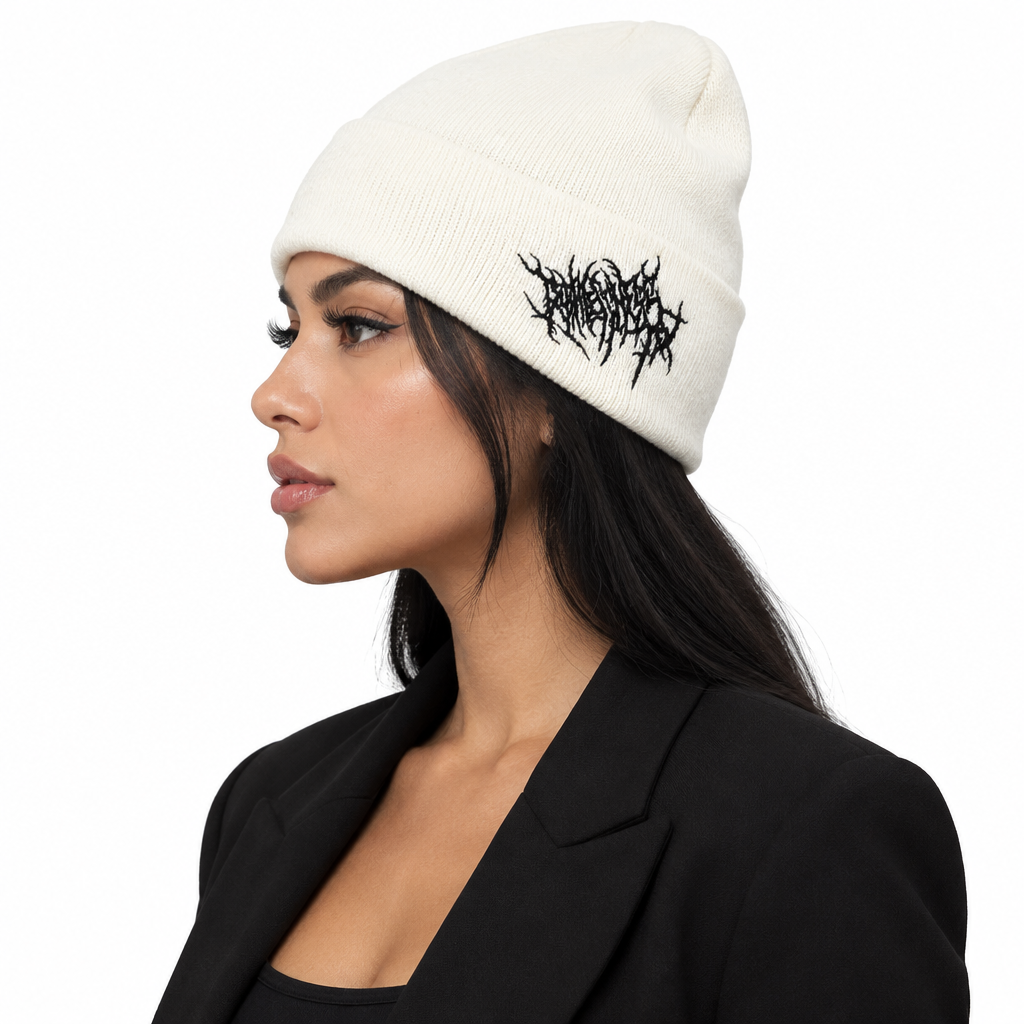 Side view lifestyle shot of white gothic embroidered beanie