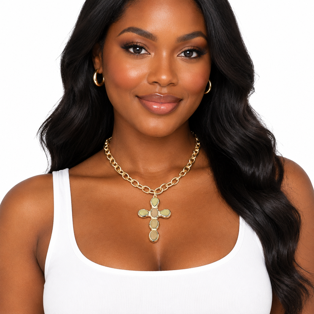 Woman wearing the gold-tone cross pendant chunky link necklace, front view